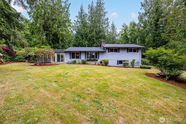 7823 Parker Rd, Sedro Woolley, WA 98284 - split level home with a front lawn and a chimney
