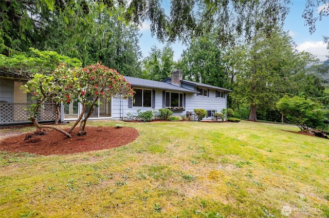 7823 Parker Rd, Sedro Woolley, WA 98284 - view of front of house with a front yard and a chimney