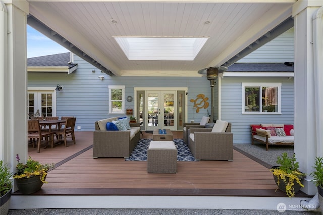 6817 Picnic Point Rd, Edmonds, WA 98026 - wooden deck featuring french doors, an outdoor hangout area, and outdoor dining area