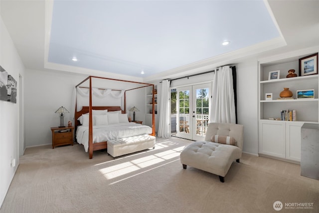6817 Picnic Point Rd, Edmonds, WA 98026 - bedroom with french doors, access to outside, carpet flooring, a raised ceiling, and crown molding