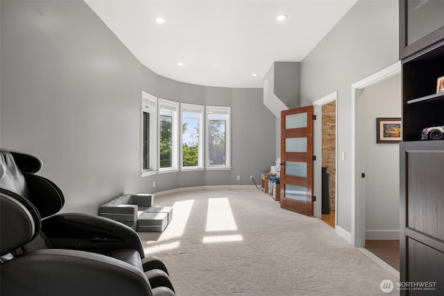 6817 Picnic Point Rd, Edmonds, WA 98026 - living area featuring light colored carpet, recessed lighting, and baseboards
