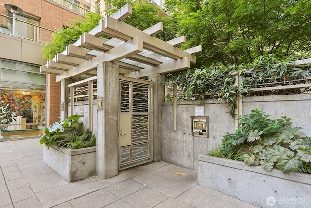 900 Lenora St Unit W106, Seattle, WA 98121 - view of exterior entry with stucco siding