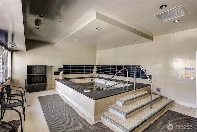 900 Lenora St Unit W106, Seattle, WA 98121 - staircase with tile patterned floors and recessed lighting