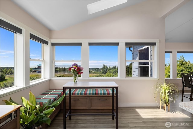 24 Jacalyn Ln, Grayland, WA 98547 - sunroom with lofted ceiling, healthy amount of natural light, wood finished floors, and a skylight
