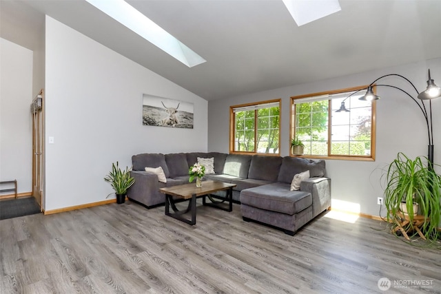 6002 35th Way SE, Auburn, WA 98092 - living area featuring a skylight, lofted ceiling, and light wood-style flooring
