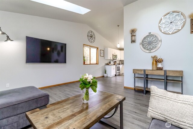 6002 35th Way SE, Auburn, WA 98092 - living room featuring a skylight, wood finished floors, and lofted ceiling