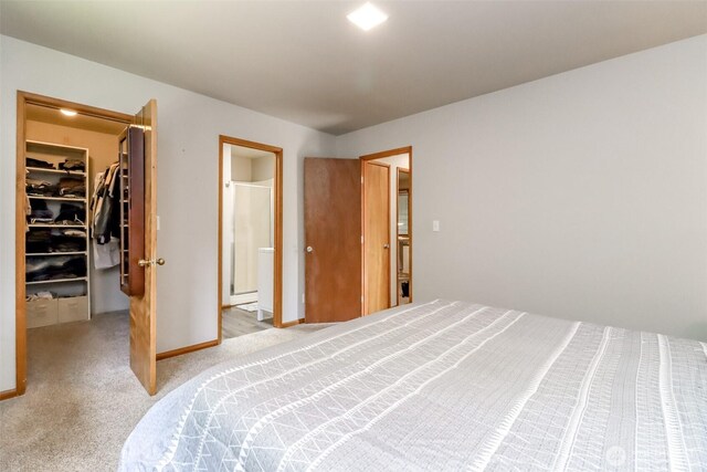 6002 35th Way SE, Auburn, WA 98092 - bedroom featuring a walk in closet, a closet, light carpet, and connected bathroom
