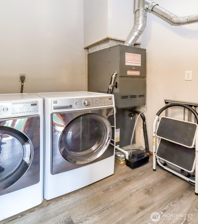 6002 35th Way SE, Auburn, WA 98092 - washroom featuring wood finished floors and washer and dryer