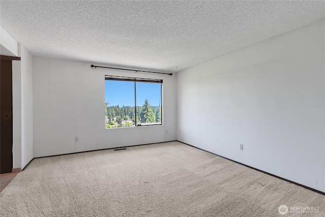 4026 SW 328th St, Federal Way, WA 98023 - carpeted empty room featuring a textured ceiling