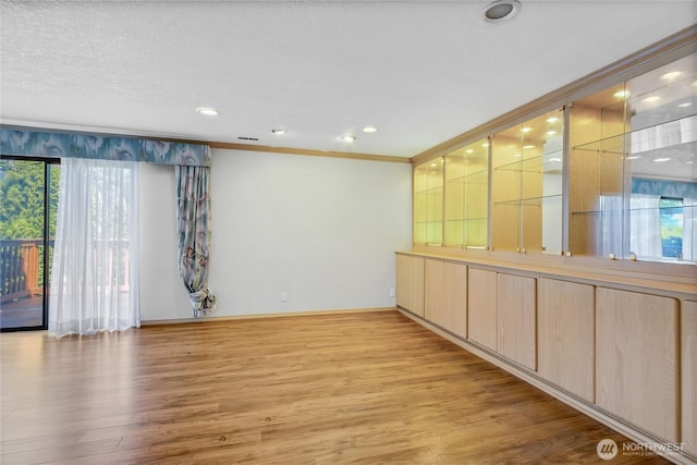 4026 SW 328th St, Federal Way, WA 98023 - spare room featuring light wood finished floors, ornamental molding, and recessed lighting