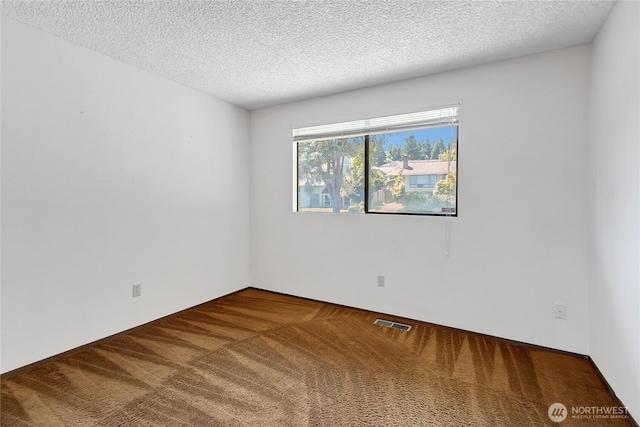 4026 SW 328th St, Federal Way, WA 98023 - carpeted empty room with a textured ceiling