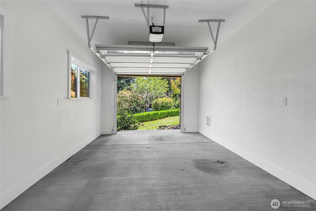 4026 SW 328th St, Federal Way, WA 98023 - garage featuring a garage door opener and baseboards