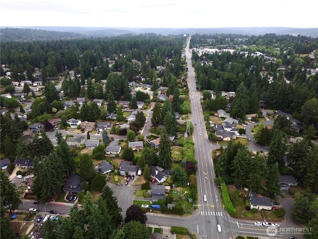 12244 NE 136th Pl, Kirkland, WA 98034 - aerial view of property and surrounding area featuring nearby suburban area and a forest