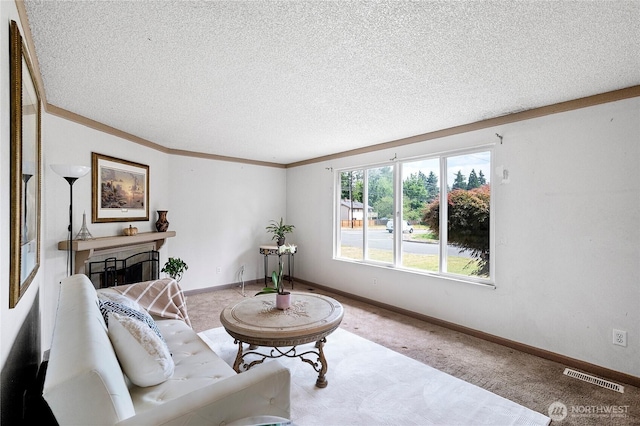 12244 NE 136th Pl, Kirkland, WA 98034 - carpeted living room with a textured ceiling, ornamental molding, and a fireplace