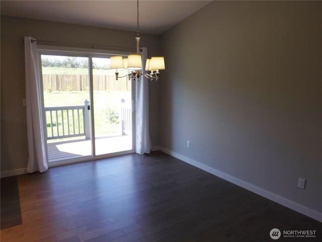 2568 Myra Pl, Langley, WA 98260 - unfurnished room featuring a chandelier and dark wood-style floors