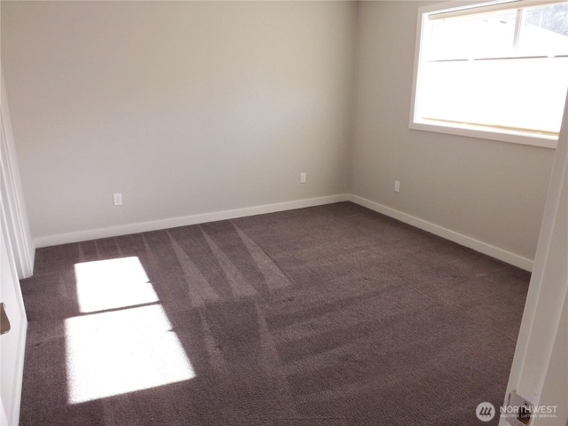 2568 Myra Pl, Langley, WA 98260 - unfurnished room featuring dark carpet and baseboards