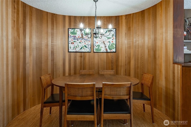 10500 Mt Baker Hwy Unit 905, Deming, WA 98244 - dining room featuring a chandelier and wooden walls