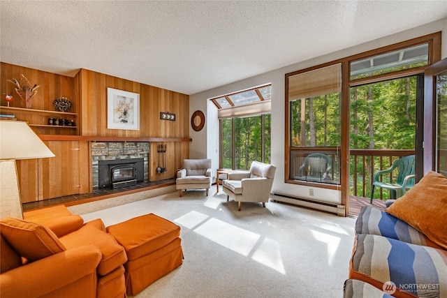 10500 Mt Baker Hwy Unit 905, Deming, WA 98244 - living area featuring baseboard heating, carpet, wooden walls, and a textured ceiling