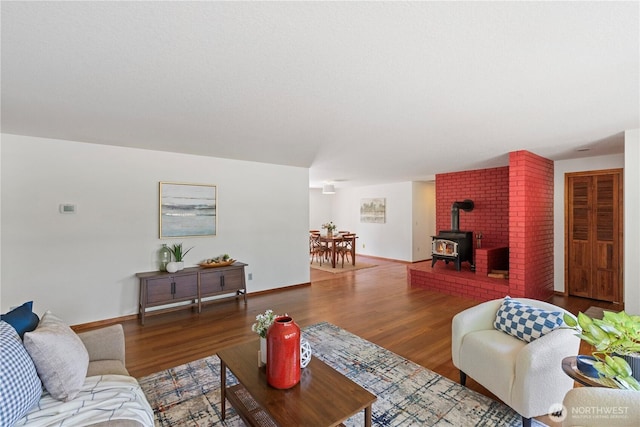 1443 U St, Port Townsend, WA 98368 - living area featuring wood finished floors and a wood stove