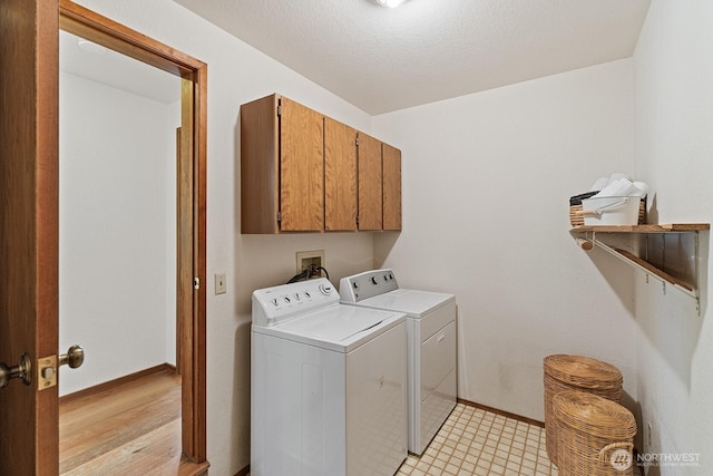 1443 U St, Port Townsend, WA 98368 - washroom featuring independent washer and dryer and cabinet space