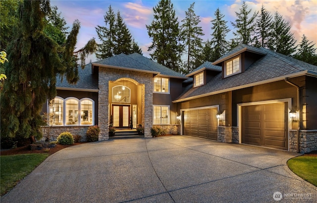 7531 Hawkstone Ave SW, Port Orchard, WA 98367 - view of front of house featuring stone siding and a garage