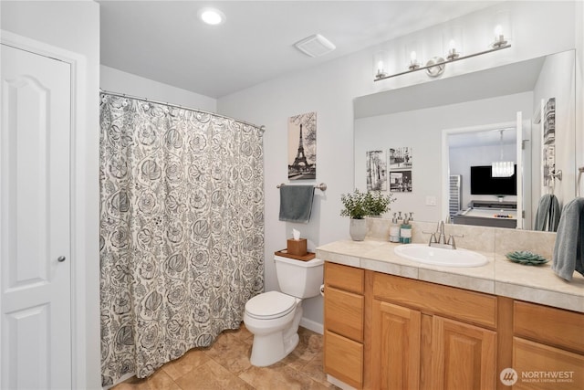 7531 Hawkstone Ave SW, Port Orchard, WA 98367 - bathroom featuring vanity, toilet, tile patterned floors, and curtained shower