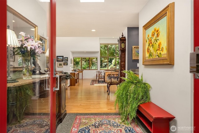 9000 NE Hidden Cove Rd, Bainbridge Island, WA 98110 - corridor with wood finished floors and recessed lighting