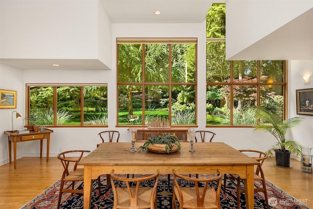 9000 NE Hidden Cove Rd, Bainbridge Island, WA 98110 - dining area featuring wood finished floors and recessed lighting