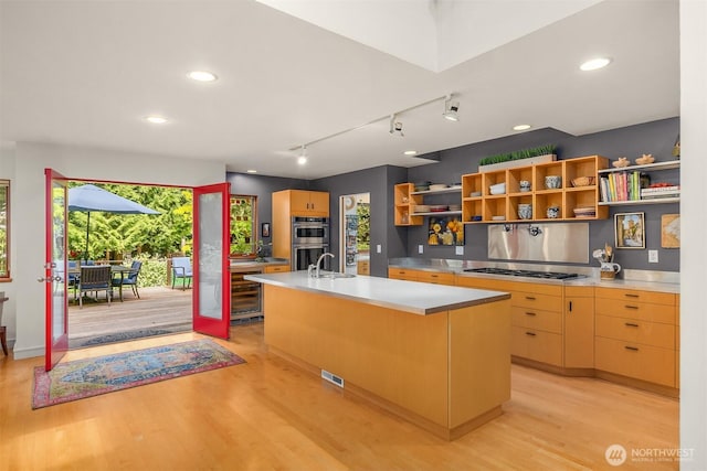9000 NE Hidden Cove Rd, Bainbridge Island, WA 98110 - kitchen featuring open shelves, stainless steel appliances, beverage cooler, light wood-style flooring, and recessed lighting