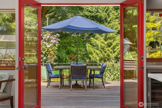 9000 NE Hidden Cove Rd, Bainbridge Island, WA 98110 - entryway featuring wood finished floors and wine cooler
