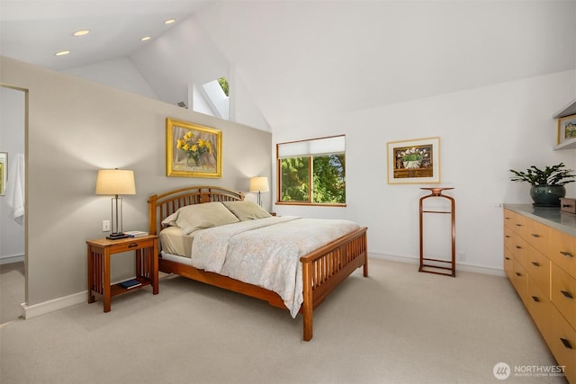 9000 NE Hidden Cove Rd, Bainbridge Island, WA 98110 - bedroom with light carpet, lofted ceiling, recessed lighting, and a skylight