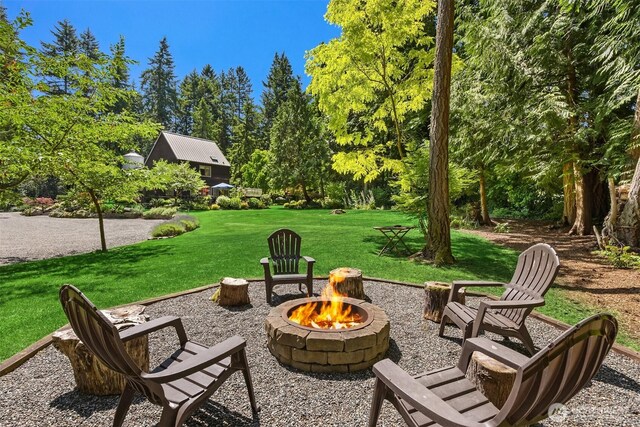 9000 NE Hidden Cove Rd, Bainbridge Island, WA 98110 - view of patio with a fire pit