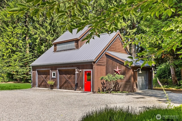 9000 NE Hidden Cove Rd, Bainbridge Island, WA 98110 - chalet / cabin with a metal roof, a barn, and an outdoor structure