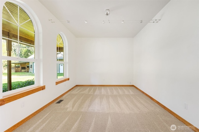 14502 45th St SW, Lakebay, WA 98349 - empty room featuring light colored carpet and baseboards