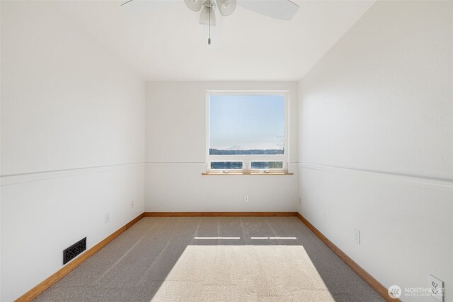 14502 45th St SW, Lakebay, WA 98349 - unfurnished room featuring carpet flooring, a ceiling fan, and baseboards