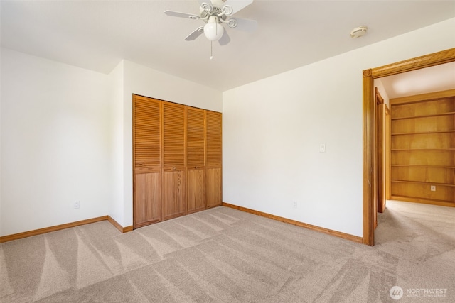 14502 45th St SW, Lakebay, WA 98349 - unfurnished bedroom with carpet, a closet, and baseboards