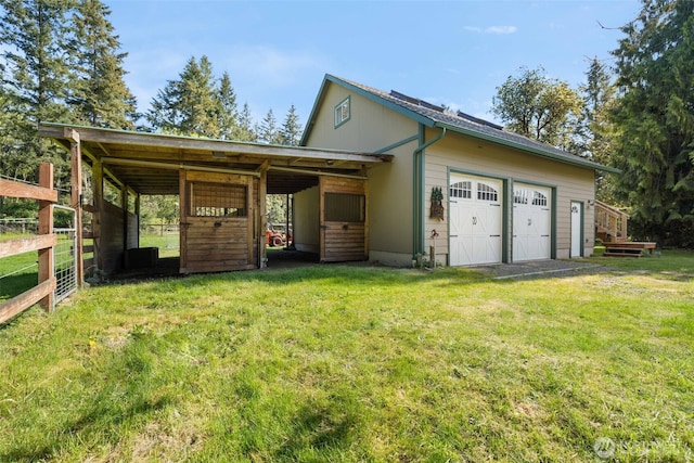 14502 45th St SW, Lakebay, WA 98349 - view of front facade featuring an attached garage and an exterior structure