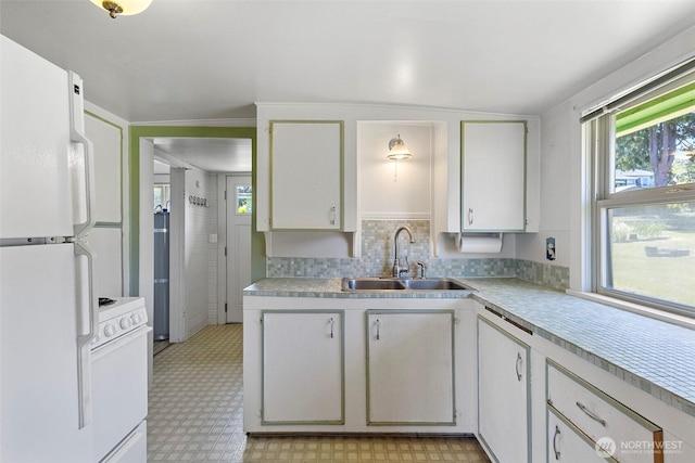 967 High Rd, Camano Island, WA 98282 - kitchen featuring white appliances, light countertops, white cabinetry, and light flooring