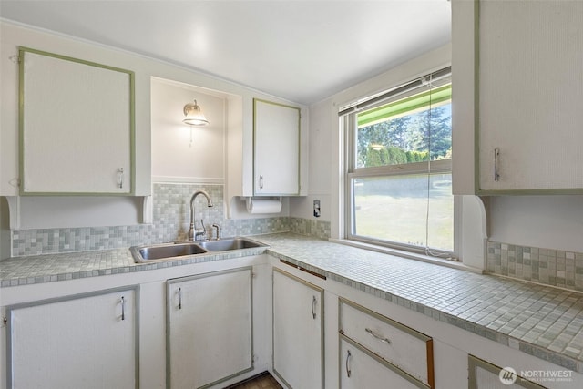 967 High Rd, Camano Island, WA 98282 - kitchen featuring decorative backsplash and light countertops