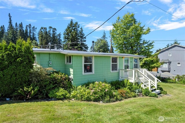 967 High Rd, Camano Island, WA 98282 - view of home's exterior with a lawn