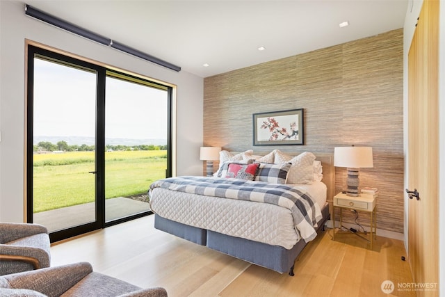335 Brickwood Dr, Walla Walla, WA 99362 - bedroom with access to outside, light wood-style floors, an accent wall, and recessed lighting