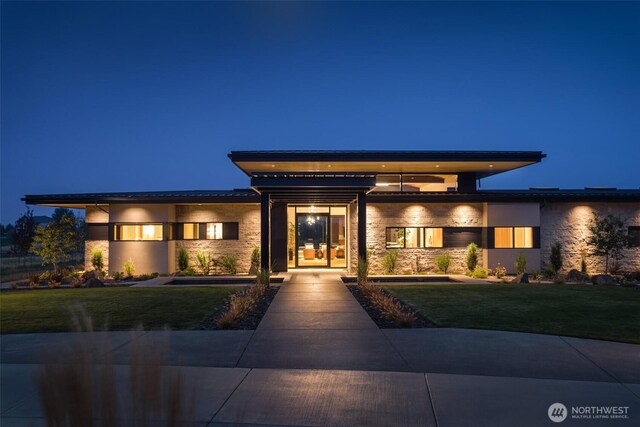 335 Brickwood Dr, Walla Walla, WA 99362 - view of front of home with a lawn and stone siding