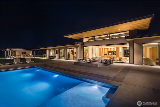 335 Brickwood Dr, Walla Walla, WA 99362 - pool at twilight with outdoor lounge area, an outdoor pool, and a patio