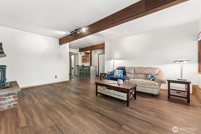 15602 26th Ave SW, Burien, WA 98166 - living room featuring beam ceiling, wood finished floors, and baseboards