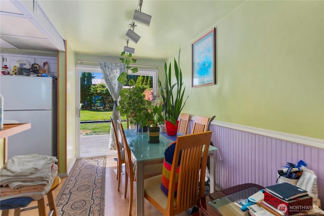 12421 2nd Ave S, Seattle, WA 98168 - dining area featuring wood finished floors and wainscoting