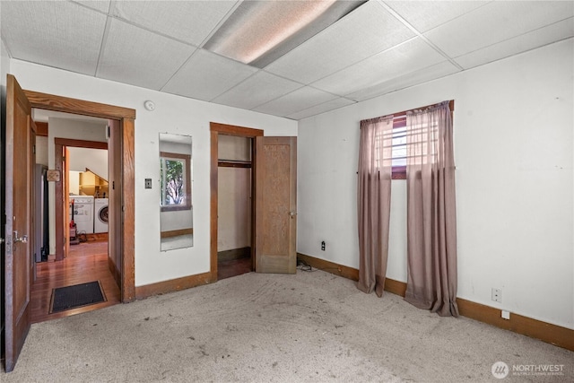 3626 E J St, Tacoma, WA 98404 - unfurnished bedroom with separate washer and dryer, multiple windows, carpet flooring, a paneled ceiling, and a closet