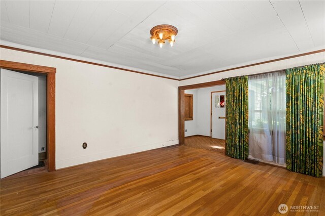 3626 E J St, Tacoma, WA 98404 - spare room with wood finished floors and ornamental molding