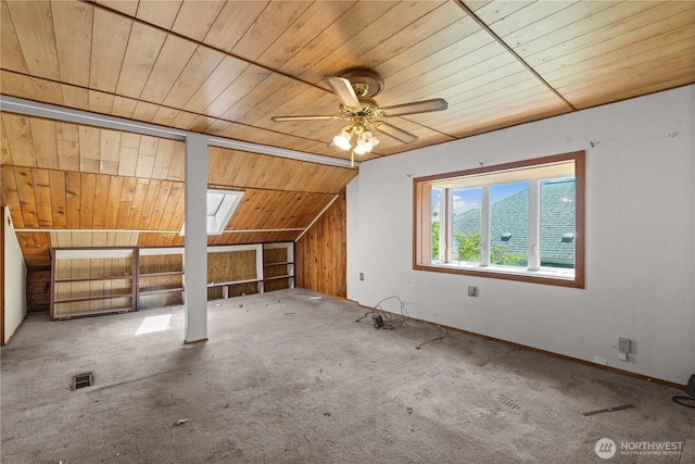 3626 E J St, Tacoma, WA 98404 - bonus room featuring vaulted ceiling, wood ceiling, carpet, a ceiling fan, and a skylight