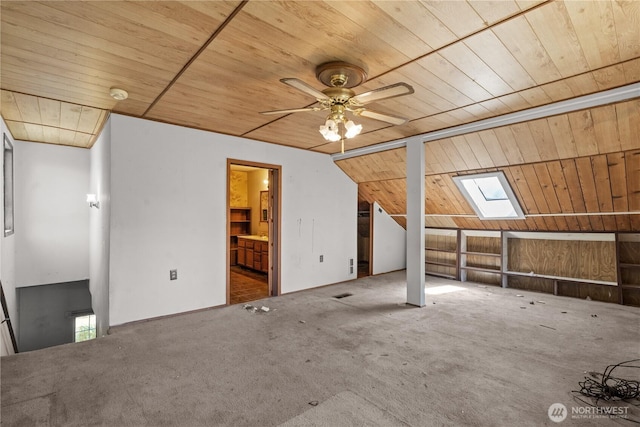 3626 E J St, Tacoma, WA 98404 - additional living space with wood ceiling, a skylight, vaulted ceiling, carpet flooring, and ceiling fan