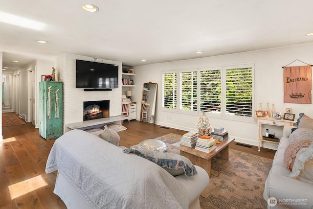 8824 224th St SW, Edmonds, WA 98026 - living room with a fireplace, wood finished floors, recessed lighting, and baseboards